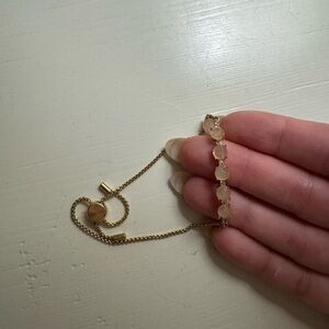 Elegant Gold Bracelet with Cream Accents